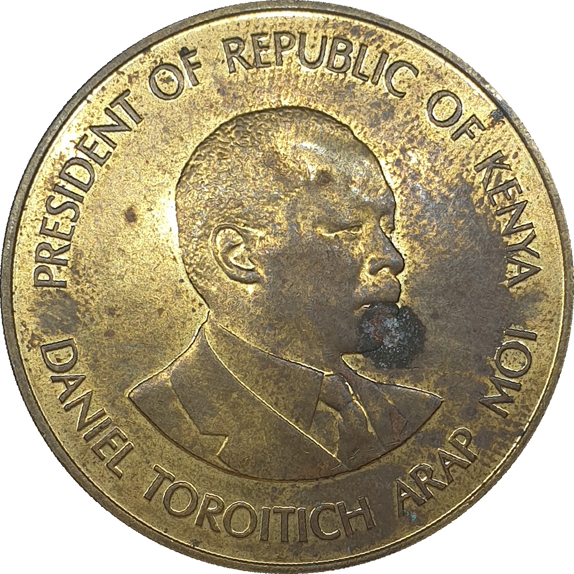 10 cents - Daniel Toroitich - Large arms - Brass plate